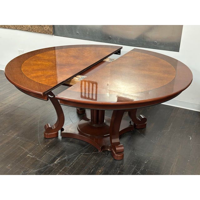 Design Plus Gallery presents a Custom Design Extension Table by E-Street Makers. Elevate your dining or meeting space with...