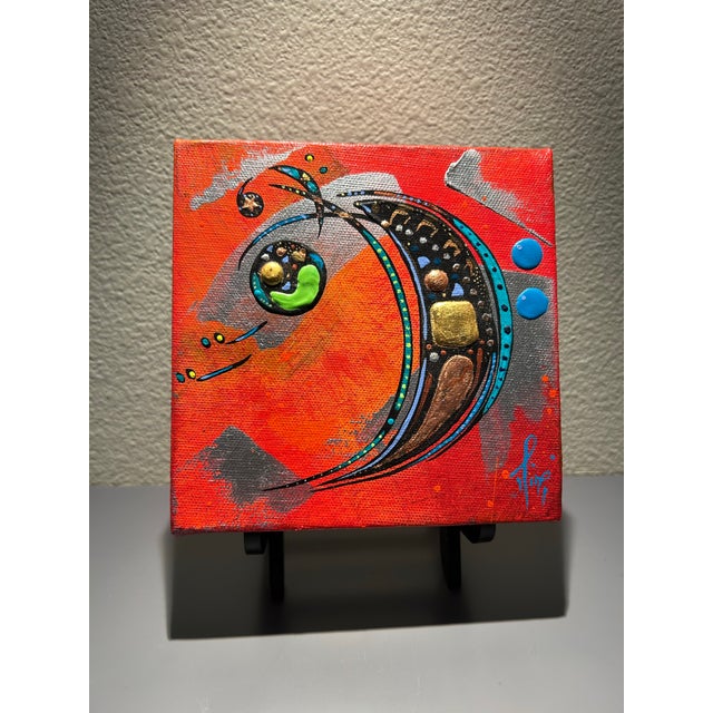 “ 6 x 6” decorative art plaque on tripod stand featuring a vibrant texture design . A unique rustic accent piece perfect...
