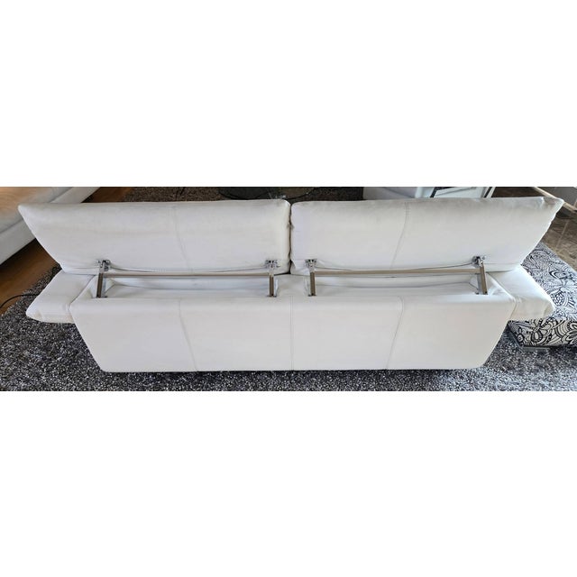 Authentic Roche Bobois white leather sofa with adjustable backrests and modern European design, believed to be from the...