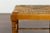 A pair of English vintage walnut stools from the mid-20th century, with faux bamboo bases and rush seats. Created in...