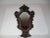 Vintage Venetian style Italian mirror made by Palladio. The frame has a walnut finish with maroon rub thru and a cream...