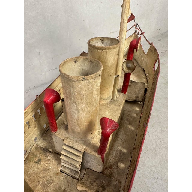 Quite large model boat ‘steamer’. Brutalist, and no less decorative for it. Made by Emmanuel Hiel. Emmanuel Hiel was an...