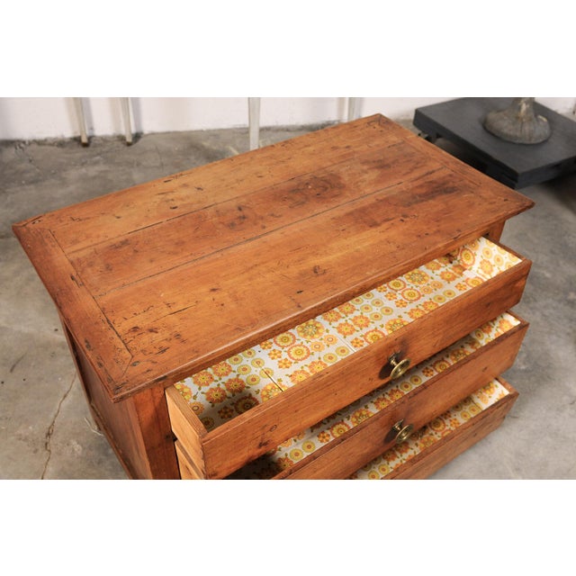 This charming Small Empire Chest of Drawers showcases the understated elegance and practical craftsmanship of the early...