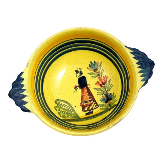 Vintage Henriot Quimper Soleil Yellow Handled Bowl With Breton Woman & Floral Motif For Sale