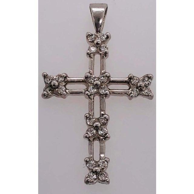 !4Kt White Gold Cross Pendant with Diamond 0.25 Total Diamond Weight 1.96 grams total weight
