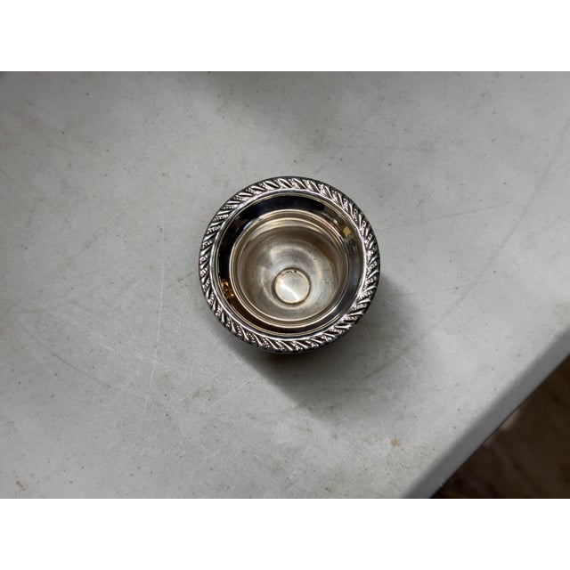 This is a vintage sterling silver urn trophy cup. It is made by Preisner Silver Company. It is a good size to store...