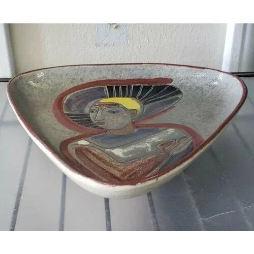 It measures 17 15/16" tall, 8 7/16" wide, and 1 3/8" deep. The piece is in great overall condition with minor signs of...