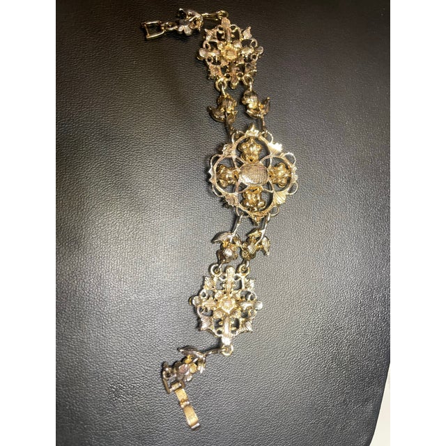 Mid-Century Modern MCM Jewelry by Bohemian (Czech) Artisans. Panel Link Bracelet Large Faceted Oval Ruby Glass Stone, Surrounded by Quatrefoil-Arranged Floral Clusters. For Sale - Image 3 of 8
