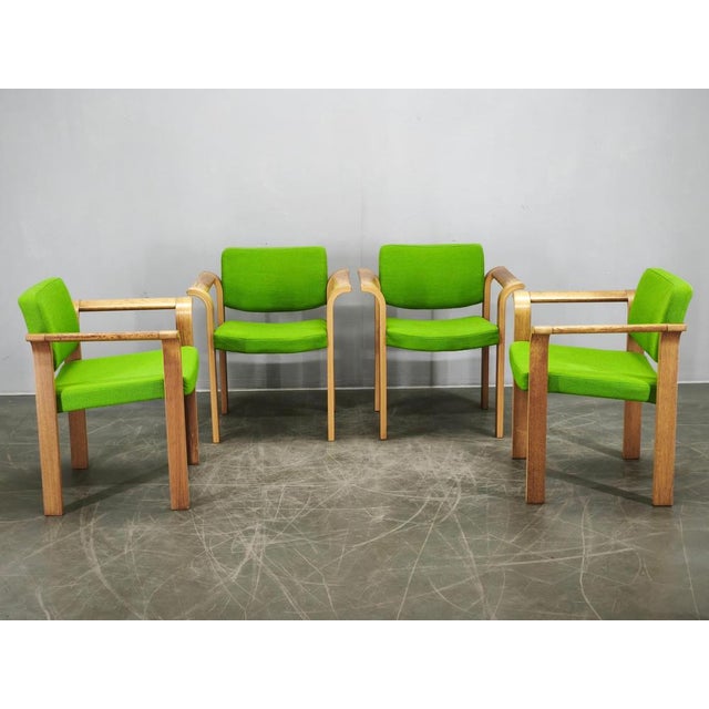 Rare set of four Danish modern armchairs designed and manufactured by Magnus Olesen, Durup, Denmark, during the 1960s....