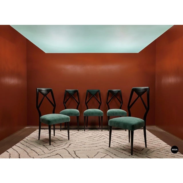 A set of five black lacquered walnut chairs with gray velvet seats, attributed to Vittorio Dassi, one of the most...