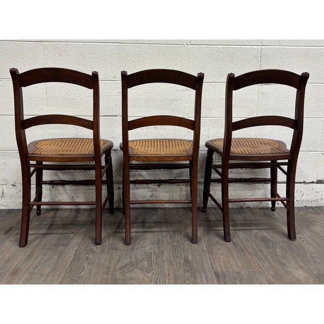 Wood Vintage Victorian Eastlake Style Ladder Back Cane Seat Dining Chairs - Set of 3 For Sale - Image 7 of 9