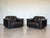 Pair of dark brown leather armchairs, DS 101 model produced by the Swiss company De Sede in the 70s, the peculiarity of...