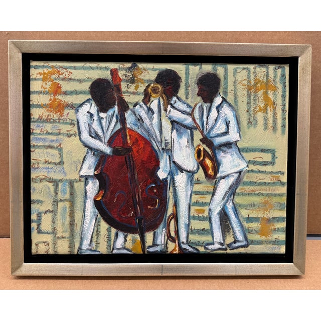 Lovely depiction of a Jazz Trio, oil on canvas in a silver gilt floater frame.