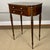 A finely crafted antique Federal revival mahogany work table or sewing stand, likely dating to the early 20th century in...