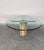 Solid marble base with gold cross supports and a wide, thick glass top. Can sit 6 comfortably and is in excellent shape...