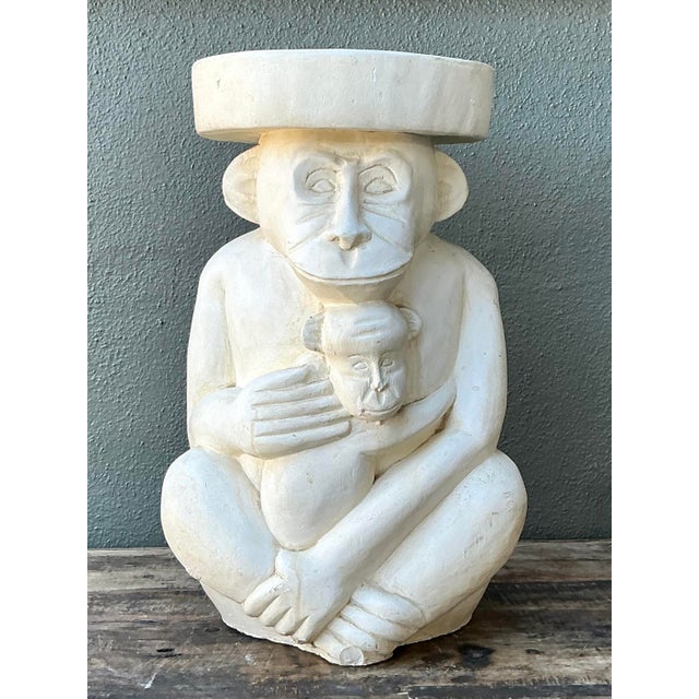 This whimsical vintage monkey stool is a masterful example of Hollywood Regency playfulness and sculptural form. Hand-cast...