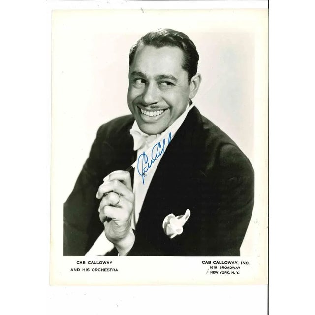 Cab Calloway Portrait is an original photograph realized in the half of 20th century. Black and white photograph depicting...