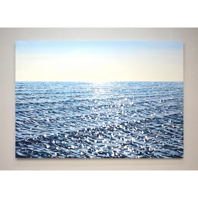 In this piece, I've captured the serene expanse of the ocean, where gentle waves dance with the sun's glimmering...