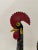 Vibrant hand-painted ceramic rooster from Portugal, richly detailed in traditional Barcelos folk motifs with heart and...