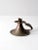 This is an antique copper chamberstick. The classic candlestick holder has beautiful lines and a lovely patina.