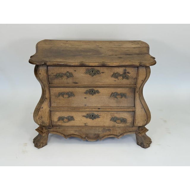 This charming Dutch Baroque style chest of drawers is crafted from bleached oak. Features three drawers with original...