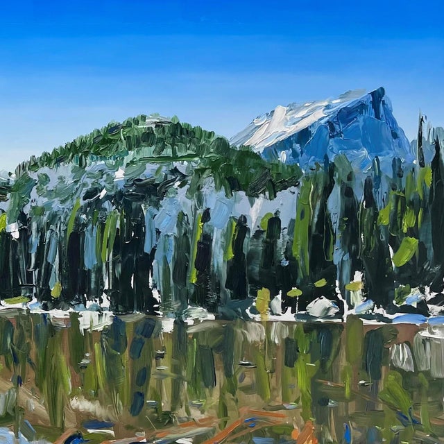 The painting captures the serene beauty of Nymph Lake in Rocky Mountain Park, showcasing a vibrant interplay of color and...