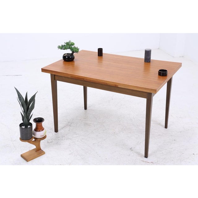Wonderful extendable vintage dining table from the 60s Vintage design * High-quality workmanship * Material: Wood *...