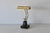 Vintage classic-style polished brass and black marble piano/bankers desk lamp. Polished brass hood and dual curved neck,...