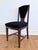 A set of four Dutch Art Deco dining chairs, dating to the 1930s. The chairs have strong geometric lines, a high...