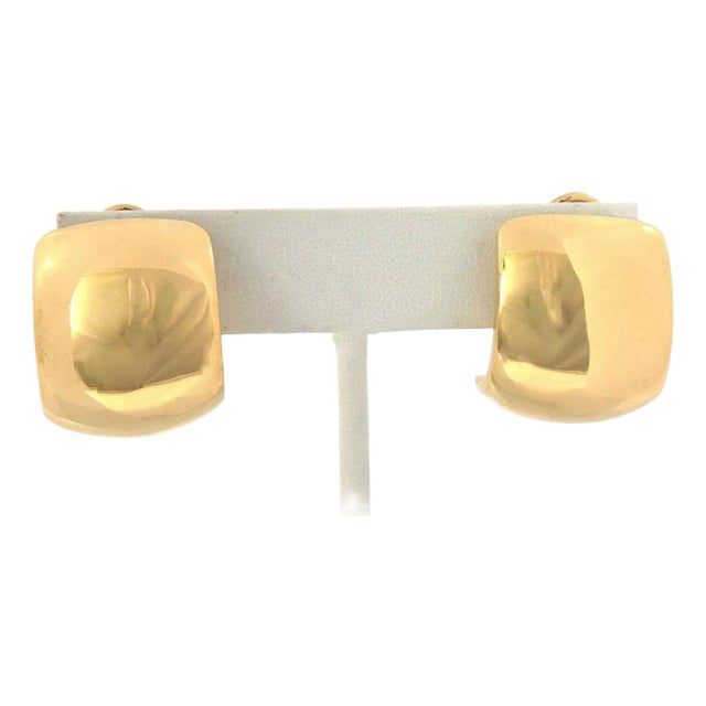 This fashionable pair of earrings are by Mayor's Jewelers, crafted from 18k yellow gold with a high polished finish...