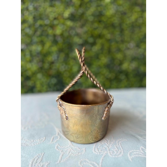 Quality construction by an iconic company, this dainty basket can hold an array of cute items. It was previously used in a...