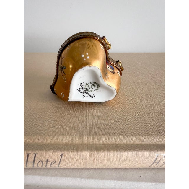 A petite treasure steeped in old-world charm, this Vintage Rochard Limoges Heart Trinket Box is a delightful example of...