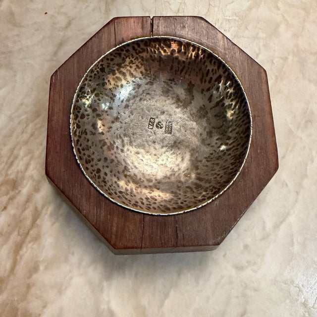 For your consideration, a William Spratling octagonal wood and silver dish, likely functioning as an ashtray or a small...