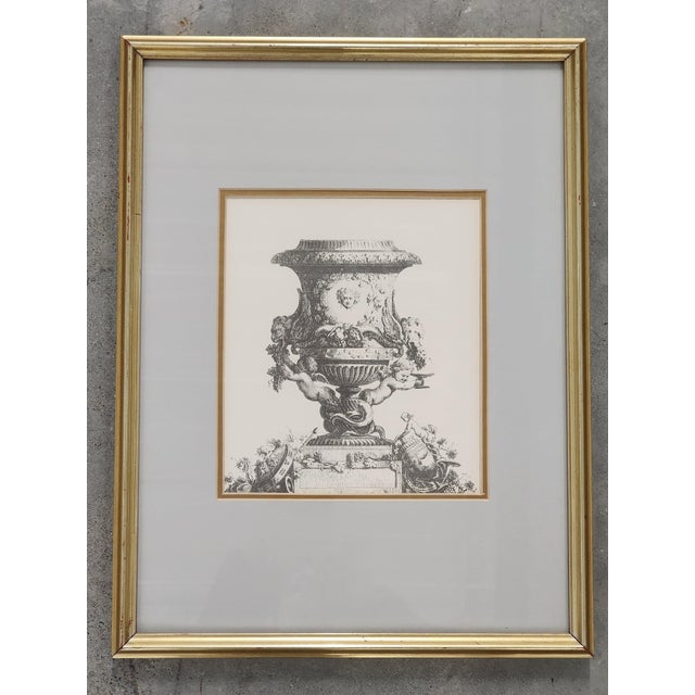 Vintage French Rococo style framed etching print of a 18th century French urn designed by Jacques François Joseph Saly....