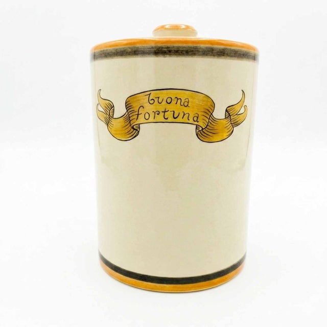 Lenci galleon jar, circa 1940, with lid. Cylindrical in shape, it is made of cast ceramic with a galleon decoration in a...