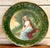 Theodore Haviland Limoges Vienna-Style Portrait Charger, Solitude, c. 1900 A refined Théodore Haviland Limoges porcelain...