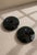 A striking pair of Royal Copenhagen dark green art glass candlesticks designed by renowned Danish glass designer Per...
