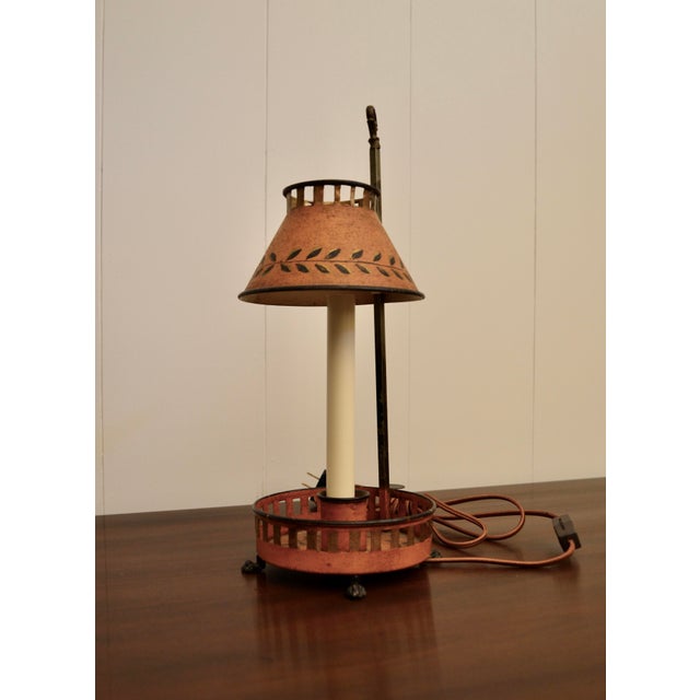 Tole bouillotte candlestick lamp. Retaining its original and unrestored finish with a lovely patina. Having new socket...
