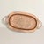 The hammer marks are the signature here, not a name, but the evidence of the hand that made it. This early 20th-century...
