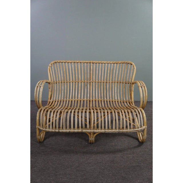 This beautifully designed Dutch Design 2 Ziss Bank made in the 1950s "in the Netherlands. This rattan Belse 8, 2 -seater...