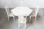 Extendable 1980s Mario Sabot Dining Table with 5 Lacquered White Chairs This stylish 1980s extendable dining set by Mario...