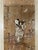 A pair of antique Chinese multi-color silk embroidery wall panels depicting two immortals; one female and the other male....
