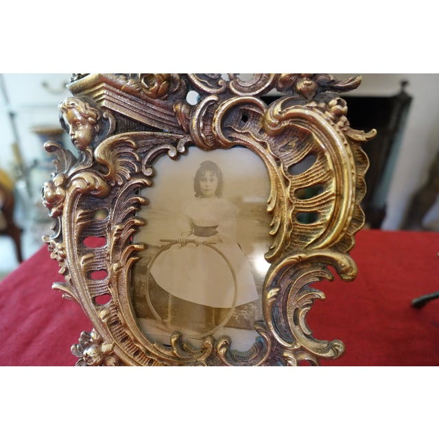 A very beautiful pair of gilt bronze picture frames, a real showstopper. Richly decorated in the Baroque/Rococo style,...