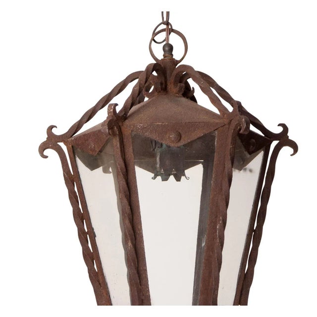 You will find lanterns much like this over many exterior doorways of old homes in Florence. Generally there they are hung...