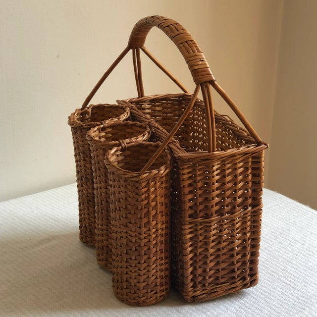 Offering a beautiful mid-20th century, French-style picnic / market basket. This three-bottle open basket is perfect for...
