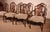 Exquisite and rare set of six chairs and two armchairs from the 19th century in English mahogany. A beautiful and superbly...