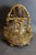 Liquor cellar in gilded bronze chiseled with foliage, musical instruments, eggs, canals and vines. This covered pagoda-...