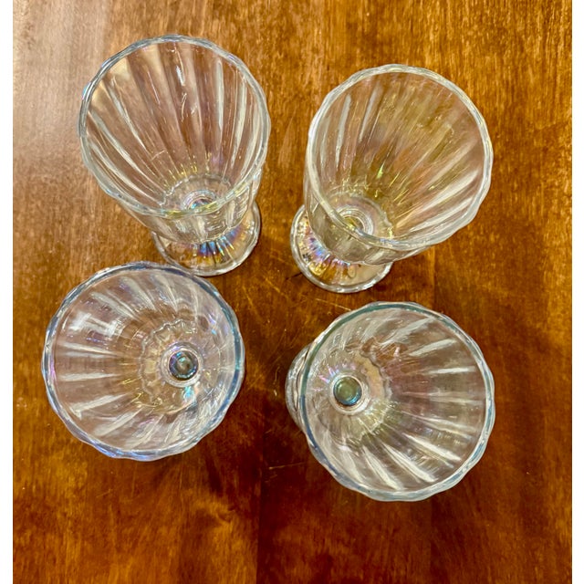 Recreate a nostalgic diner or soda fountain experience at home with these beautiful iridescent glasses, perfect for...