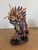 Vintage Chinese cloisonné dragon sculpture featuring vibrant enamel work in rich red, blue, green, and gold tones. Finely...