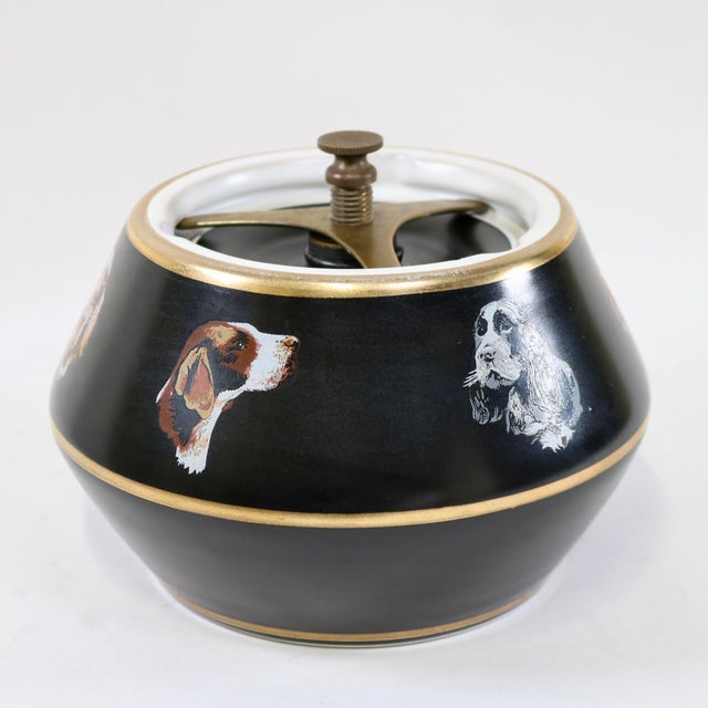 A handsome mid-century English ceramic tobacco humidor jar manufactured by Denby under their "Cross Keys" mark. This...